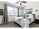 Comfortable bedroom featuring a large window for natural light and stylish décor at 4617 E La Puente Ave, Phoenix, AZ 85044