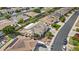 High angle view of a property with a landscaped yard and multiple trees at 4665 E Dartmouth St, Mesa, AZ 85205