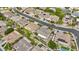 Wide aerial view of a neighborhood with many houses, streets, and landscaping at 4665 E Dartmouth St, Mesa, AZ 85205