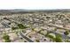 Extensive aerial view of a dense community with neatly planned streets and homes at 4665 E Dartmouth St, Mesa, AZ 85205