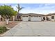 Charming single-story home features a spacious driveway and a convenient two-car garage at 4665 E Dartmouth St, Mesa, AZ 85205