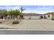 Charming single-story home features a spacious driveway and a convenient two-car garage at 4665 E Dartmouth St, Mesa, AZ 85205