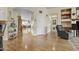 Welcoming foyer with hardwood floors, arched doorways, and easy access to living areas at 4665 E Dartmouth St, Mesa, AZ 85205