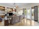 Inviting living room with hardwood floors, built-in shelves, and patio access at 4665 E Dartmouth St, Mesa, AZ 85205