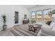 Inviting living area with large windows that bring in natural light and lovely decor at 5747 E Star Valley St, Mesa, AZ 85215