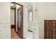 Bathroom showcasing a marble shower, custom wood door and vanity at 5902 E Arcadia Ln, Phoenix, AZ 85018