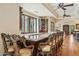 Large kitchen bar with custom seating and marble countertops is perfect for entertaining guests at 5902 E Arcadia Ln, Phoenix, AZ 85018