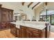 Gourmet kitchen boasts custom cabinetry, marble countertops, and a farmhouse sink at 5902 E Arcadia Ln, Phoenix, AZ 85018