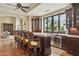 Entertain in style at this large kitchen bar, featuring gorgeous countertops and custom chairs at 5902 E Arcadia Ln, Phoenix, AZ 85018