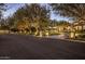 Beautifully landscaped street view showcasing an elegant home and lush landscaping at 5902 E Arcadia Ln, Phoenix, AZ 85018