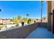 This balcony offers city views, stucco walls, and outdoor space for relaxation at 6720 W Mcrae Way, Glendale, AZ 85308