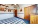 This inviting bedroom features carpet flooring, natural light, and space for dresser at 6720 W Mcrae Way, Glendale, AZ 85308