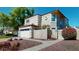 Charming two-story home with a two-car garage and well-manicured front yard at 6720 W Mcrae Way, Glendale, AZ 85308