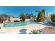 Backyard features a spacious swimming pool and deck area, great for entertaining guests at 6720 W Mcrae Way, Glendale, AZ 85308