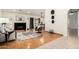 Spacious living room with fireplace, hardwood floors, and neutral tones creating a comfortable atmosphere at 7120 W Columbine Dr, Peoria, AZ 85381