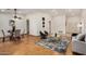 Large living room featuring an open floor plan, hardwood floors, and stylish décor at 7120 W Columbine Dr, Peoria, AZ 85381