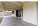 Covered patio area with ceiling fan and view of yard at 7120 W Columbine Dr, Peoria, AZ 85381