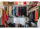 Organized walk-in closet featuring shelving, hanging racks, and ample storage space at 7726 E Baseline Rd # 156, Mesa, AZ 85209