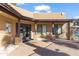 Exterior of clubhouse with covered entrance and ample natural light at 7726 E Baseline Rd # 156, Mesa, AZ 85209