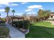 Community green space featuring grass, walking path, and a gazebo at 7726 E Baseline Rd # 156, Mesa, AZ 85209