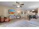 Comfortable living room flows into a dining area and modern kitchen, creating an inviting space at 7726 E Baseline Rd # 156, Mesa, AZ 85209