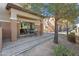 Covered patio with brick flooring and a table with chairs to enjoy the backyard at 7726 E Baseline Rd # 156, Mesa, AZ 85209