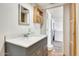 Recently remodeled bathroom with gray vanity, white marble counters, and updated fixtures at 8218 S 7Th St # 163, Phoenix, AZ 85042
