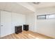 A cozy bedroom is staged with two dark wood dressers and a light ceiling fan at 8218 S 7Th St # 163, Phoenix, AZ 85042