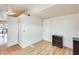 Bedroom featuring wood floors, white walls, ceiling fan, and closet access at 8218 S 7Th St # 163, Phoenix, AZ 85042