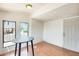 Bright dining space with hardwood floors, large windows, and ample natural light, creating a welcoming atmosphere at 8218 S 7Th St # 163, Phoenix, AZ 85042