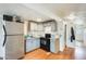 Functional kitchen design with stainless steel refrigerator and modern appliances, offering practical cooking space at 8218 S 7Th St # 163, Phoenix, AZ 85042