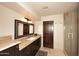 Bathroom features a large mirror, stylish vanity, and a walk-in shower with glass door at 8406 E Calle Buena Vis, Scottsdale, AZ 85255