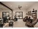 Well-lit exercise room with machines, a mirror wall, and access to the backyard at 8406 E Calle Buena Vis, Scottsdale, AZ 85255