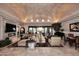 Elegant living room featuring a unique brick ceiling, fireplace, and ample seating at 8406 E Calle Buena Vis, Scottsdale, AZ 85255