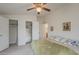 Airy bedroom boasts dual closets with easy access to the ensuite bathroom and walk-in closet at 890 E Tee St, San Tan Valley, AZ 85140