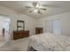 Spacious bedroom with dual dressers, providing plenty of storage and organization options at 890 E Tee St, San Tan Valley, AZ 85140