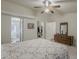 Inviting bedroom with ensuite bath and walk-in closet, offering convenience and privacy at 890 E Tee St, San Tan Valley, AZ 85140