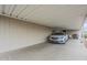 Long carport with space for car and outdoor activities at 890 E Tee St, San Tan Valley, AZ 85140