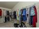 Walk-in closet offers an organized space for clothes and accessories, maximizing storage efficiency at 890 E Tee St, San Tan Valley, AZ 85140