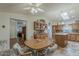 Bright kitchen featuring an island and open floor plan at 890 E Tee St, San Tan Valley, AZ 85140