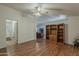 Bright living room with hardwood floors, and a cozy seating area at 890 E Tee St, San Tan Valley, AZ 85140