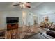 Spacious living room with an open floor plan and hardwood floors throughout at 890 E Tee St, San Tan Valley, AZ 85140