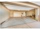 Spacious garage with plenty of storage space and an automatic garage door at 9604 S 183Rd Dr, Goodyear, AZ 85338