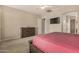 Neutral colored carpeted main bedroom with furnishings at 9604 S 183Rd Dr, Goodyear, AZ 85338