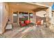 Comfortable outdoor patio with lounge chairs, creating a relaxing space for enjoying the desert views and sunshine at 9604 S 183Rd Dr, Goodyear, AZ 85338