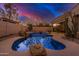Beautiful pool and backyard, surrounded by desert landscaping, and a covered patio, ideal for relaxation and outdoor enjoyment at 9604 S 183Rd Dr, Goodyear, AZ 85338