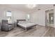 Spacious bedroom with plank floors, with ensuite bath and great natural light at 10162 E Theorem Dr, Mesa, AZ 85212