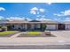 Charming single-story home features a well-maintained landscaped yard, complemented by a spacious two-car garage at 1023 E Rosemonte Dr, Phoenix, AZ 85024