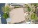 A bird's eye view of a home with a large patio area that includes outdoor seating and desert landscaping around the perimeter at 10796 E Betony Dr, Scottsdale, AZ 85255