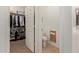 Well-organized closet and convenient half bath adjacent to the main bathroom, enhancing functionality at 10796 E Betony Dr, Scottsdale, AZ 85255
